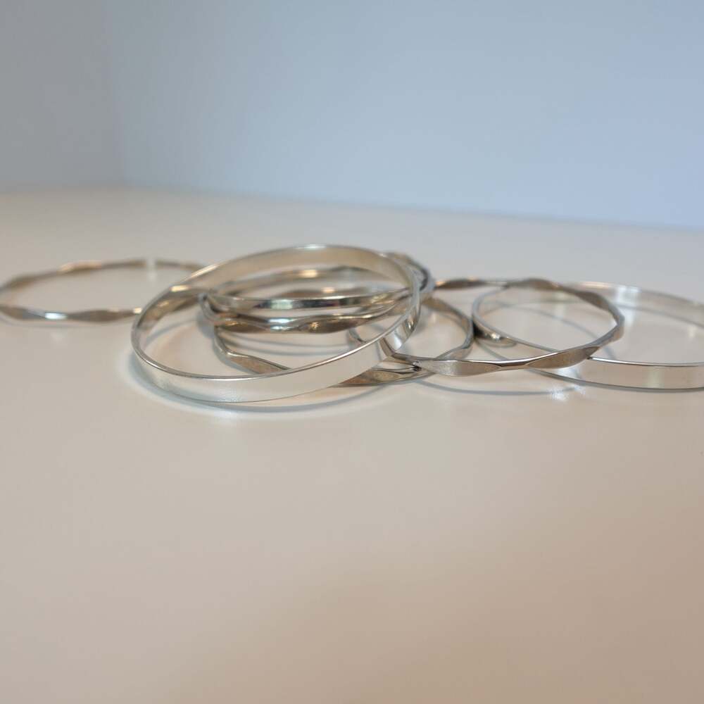 Set of 8 Y2K Silver Tone Stackable Twisted Bangle Bracelets
